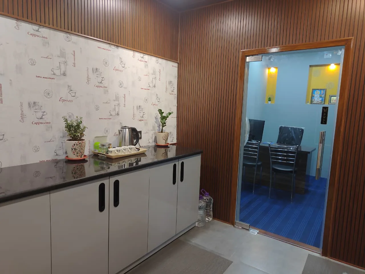 Angled view of the studio refreshment counter and adjoining room